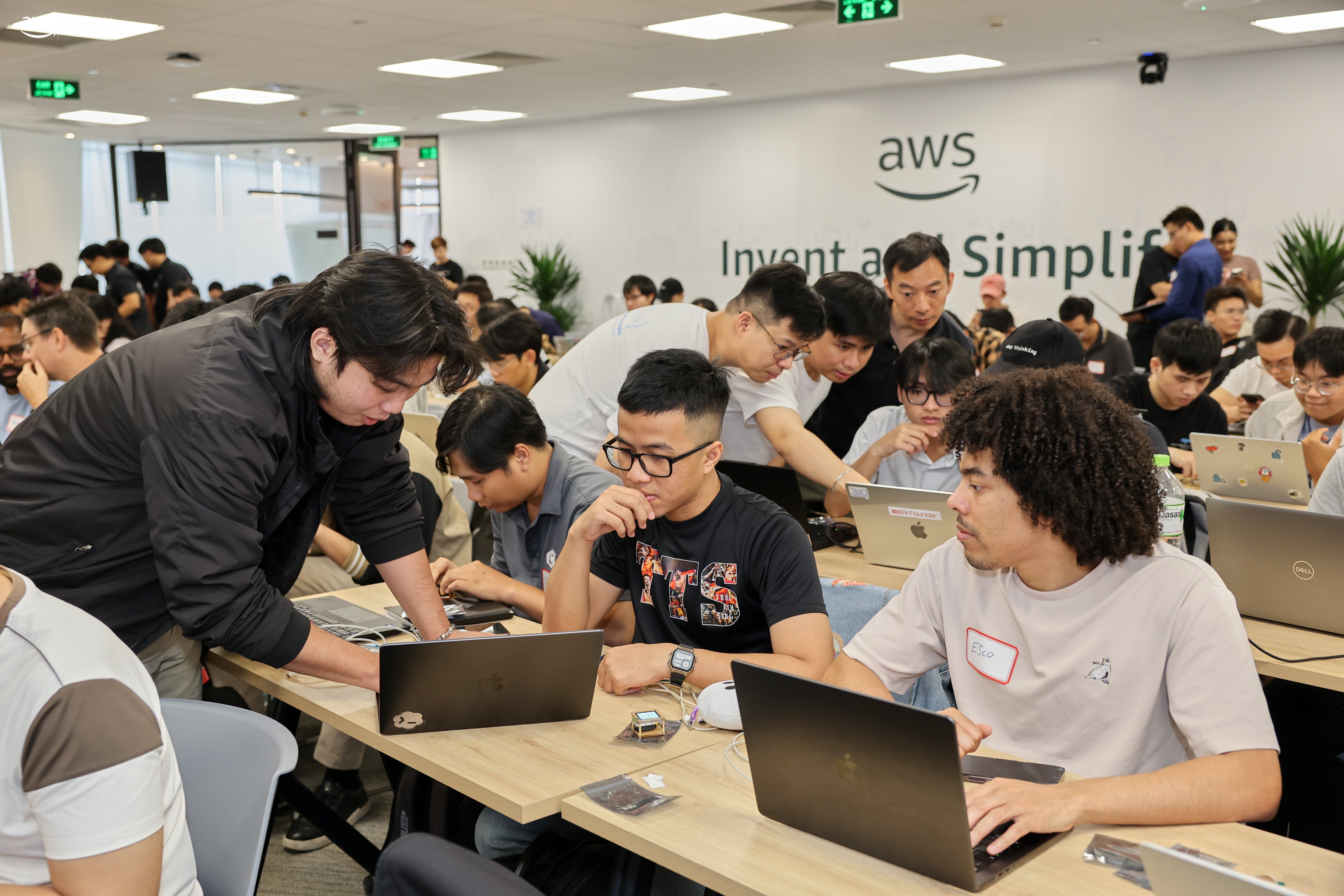 Builder teams discussing during the workshop