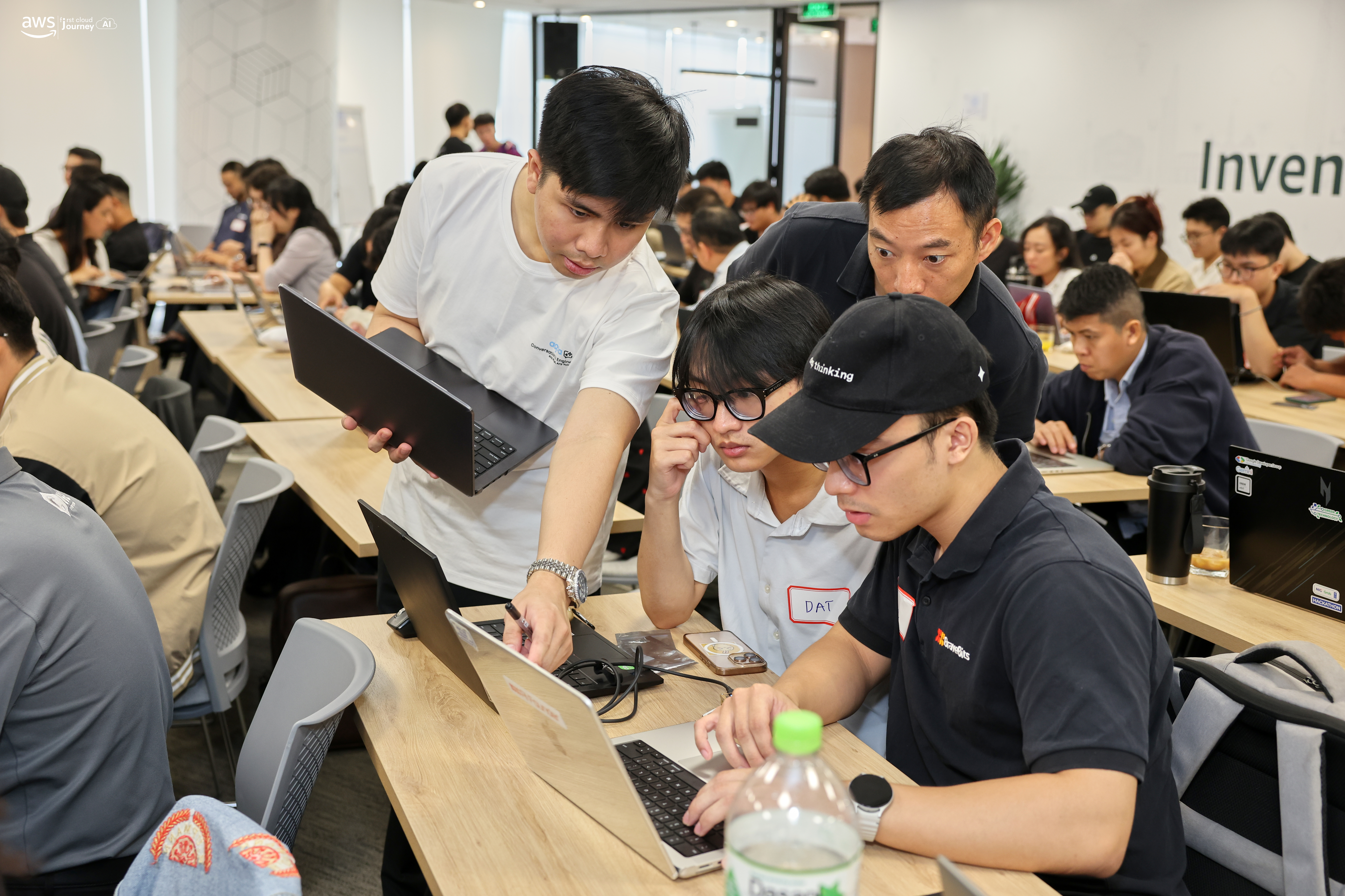 Mentor supporting a builder team during the hands-on session